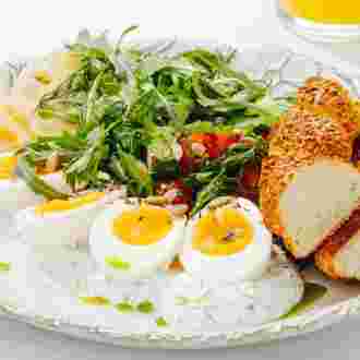 boiled-eggs-avocado-and-lightely-salted-salmon.webp