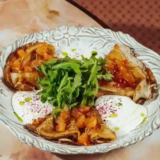 breakfast/20260609112339-crepes-with-salmon-tartare-cheese-mousse-and-red-caviar.webp