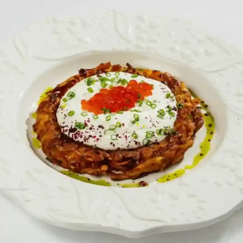breakfast/20260609112356-potato-rosti-with-creme-fraiche-and-salmon-caviar.webp