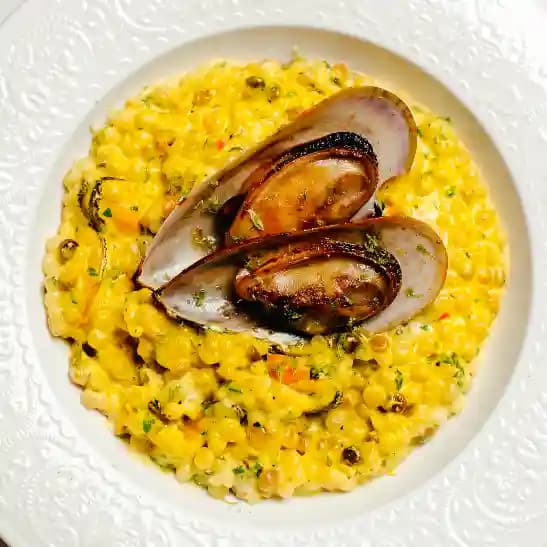 meals/20260721120957-fregola-with-mussels-and-bisque-sauce.webp