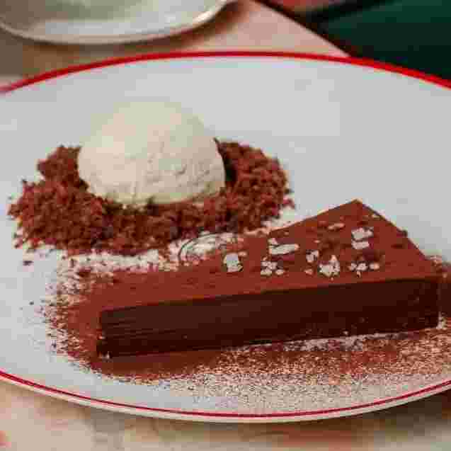 chocolate-ganache-tart-with-ice-cream.webp